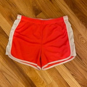 Neon orange athletic shorts